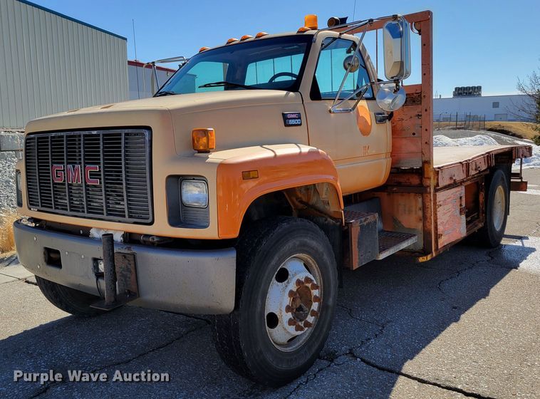 image for item MC9550 2000 GMC C6500  flatbed truck