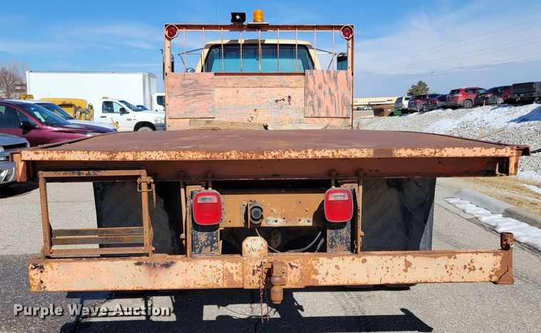 image for item MC9550 2000 GMC C6500  flatbed truck