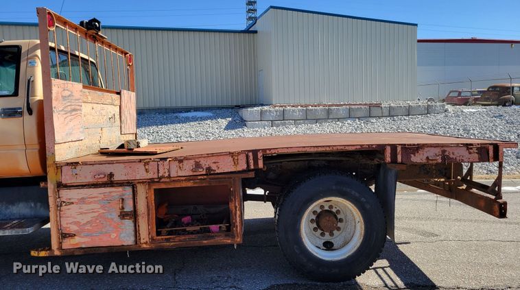 image for item MC9550 2000 GMC C6500  flatbed truck