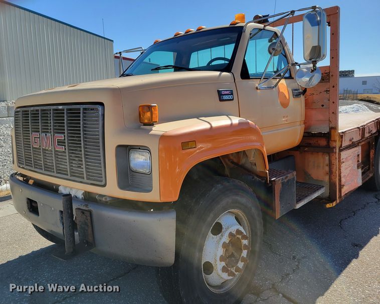 image for item MC9550 2000 GMC C6500  flatbed truck