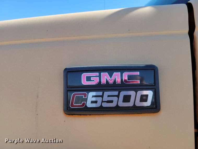 image for item MC9550 2000 GMC C6500  flatbed truck