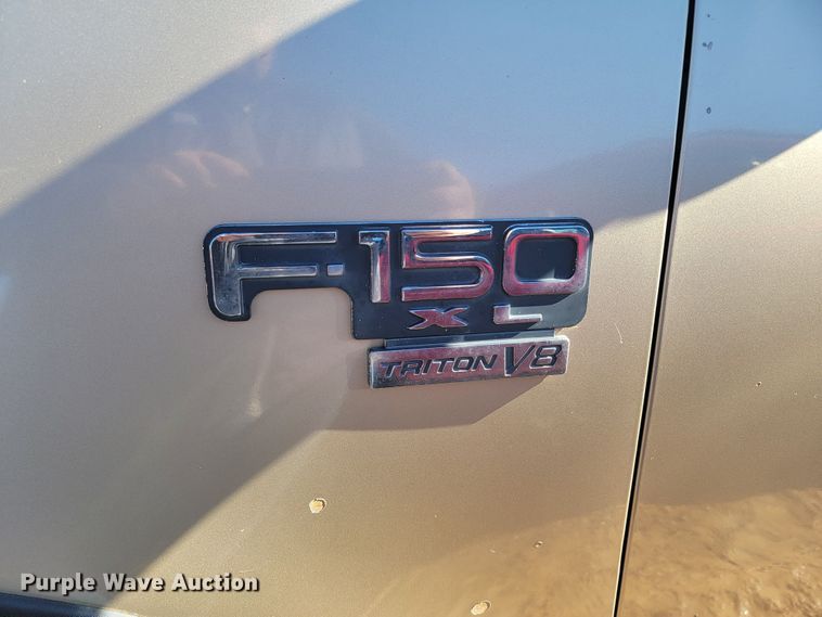 image for item ME9746 1999 Ford F150 XL  SuperCab pickup truck