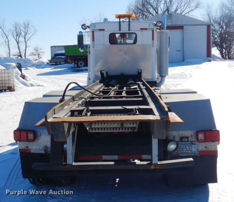 image for item KU9736 1985 Kenworth W900  roll-off container truck