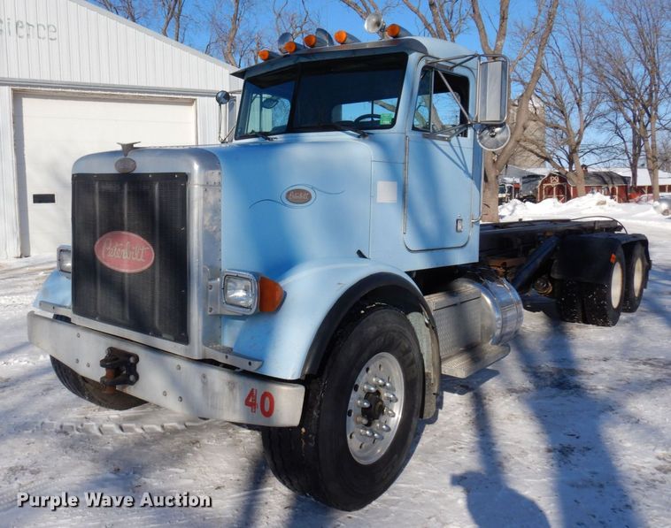 image for item KU9822 1997 Peterbilt 357  roll-off container truck