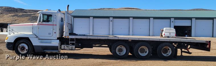 image for item ME9752 1990 Freightliner  rollback truck