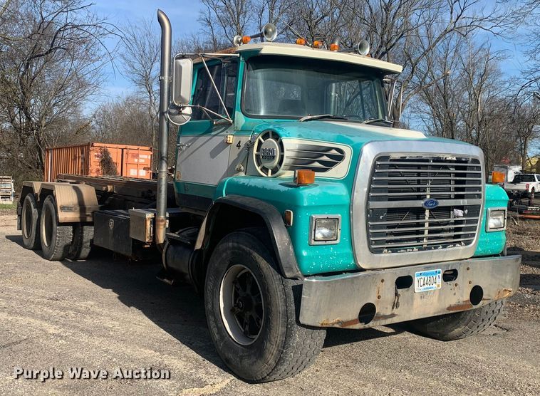 image for item MM9713 1984 Ford LNT8000  roll-off container truck