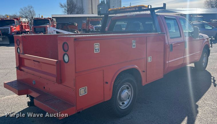 image for item DG5382 2011 Ford F250 Super Duty  Crew Cab utility bed pickup truck