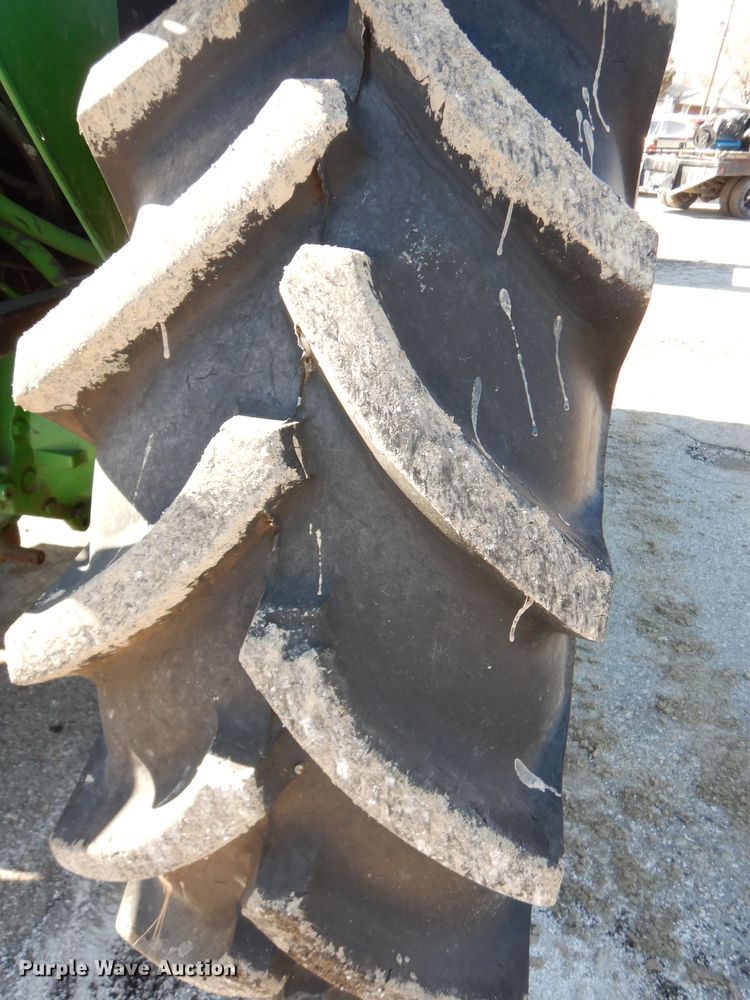 image for item DK7600 2005 John Deere 6415  tractor