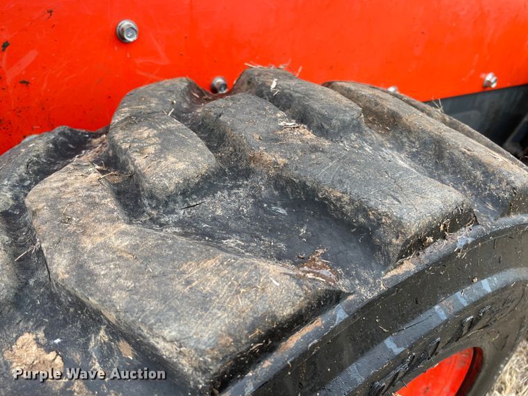 image for item DQ5738 Kubota SSV65  skid steer loader