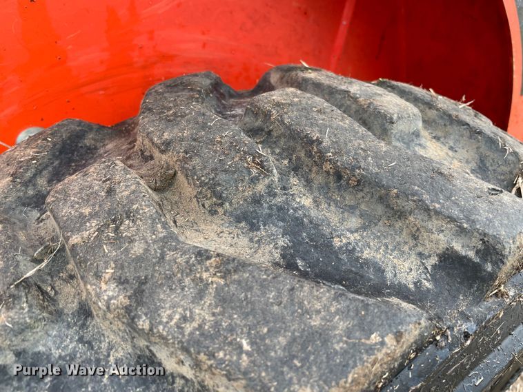 image for item DQ5738 Kubota SSV65  skid steer loader