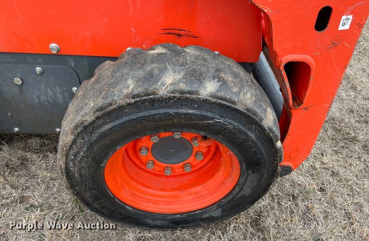 image for item DQ5738 Kubota SSV65  skid steer loader