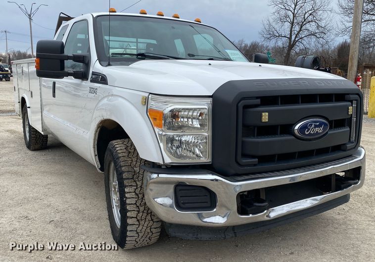 image for item DN8220 2014 Ford F350 Super Duty  SuperCab utility bed pickup truck