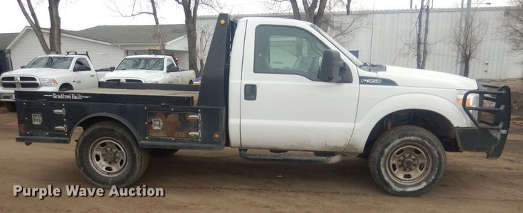 image for item HU9466 2015 Ford  F350 Super Duty  flatbed pickup truck