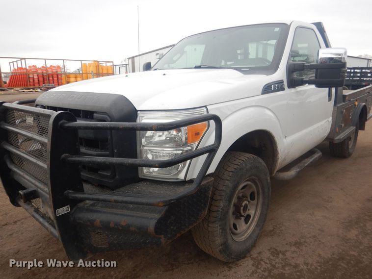 image for item HU9466 2015 Ford  F350 Super Duty  flatbed pickup truck