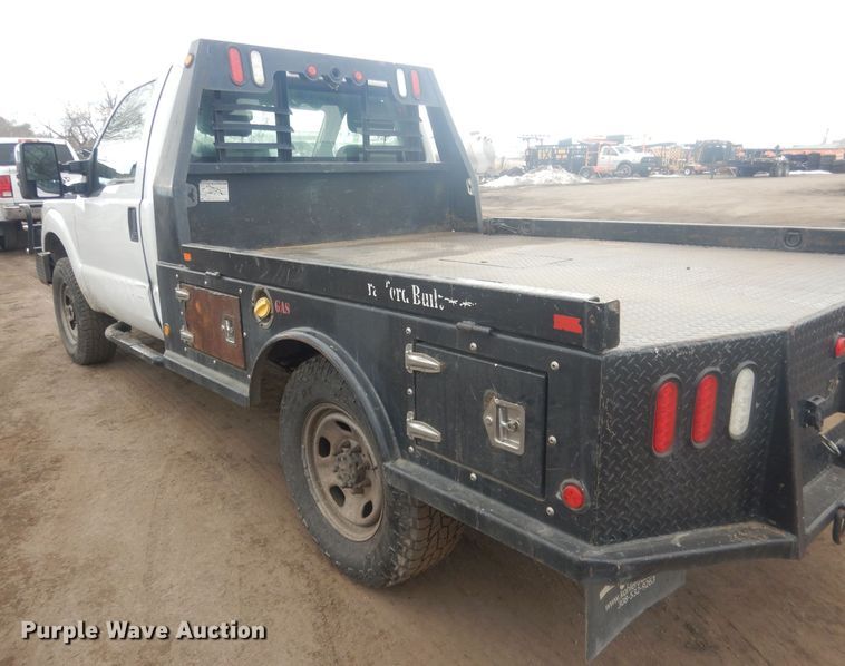 image for item HU9466 2015 Ford  F350 Super Duty  flatbed pickup truck
