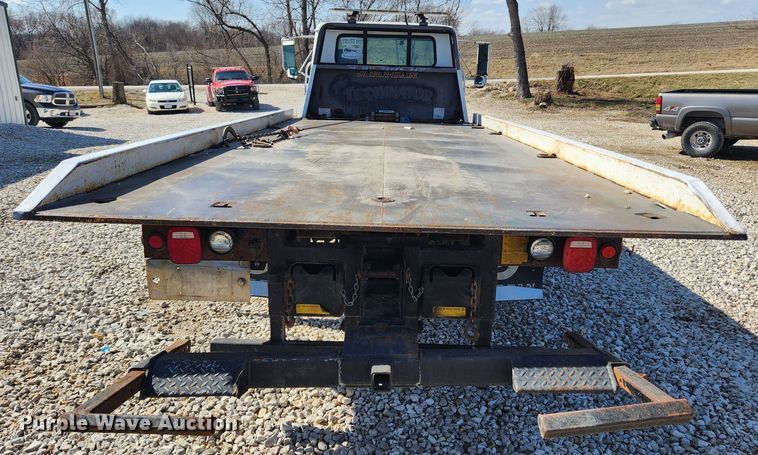 image for item JB9551 1996 International 4700  rollback truck