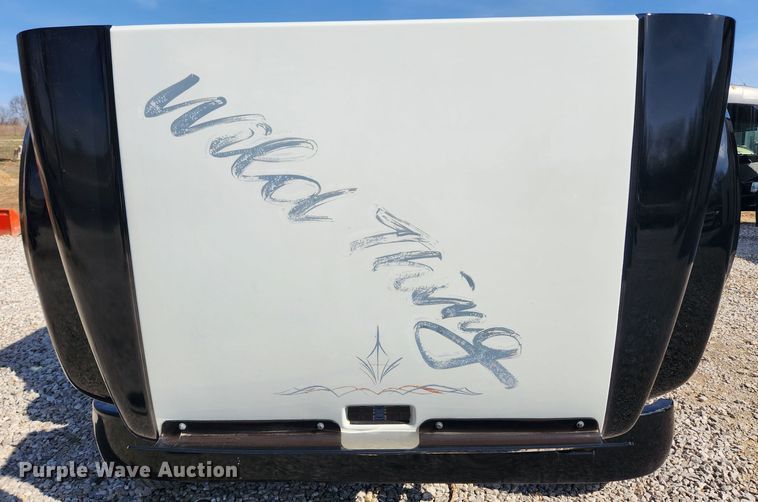 image for item JB9551 1996 International 4700  rollback truck