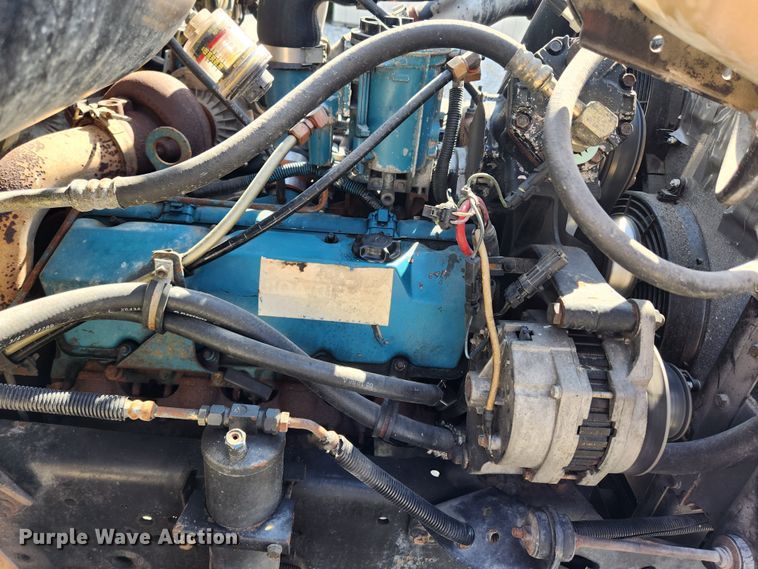 image for item JB9551 1996 International 4700  rollback truck