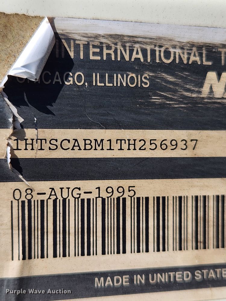 image for item JB9551 1996 International 4700  rollback truck