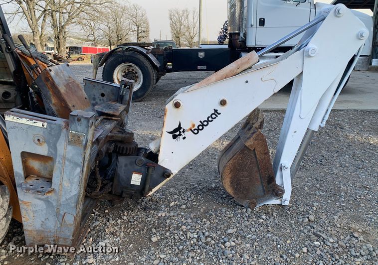 image for item MM9772 Bobcat 709  skid steer backhoe