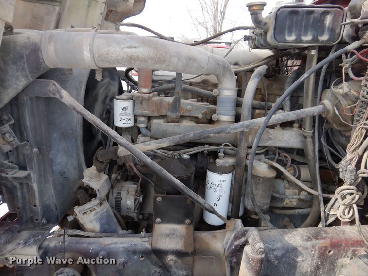 image for item IO9362 1995 Mack RD688S  pothole patcher truck