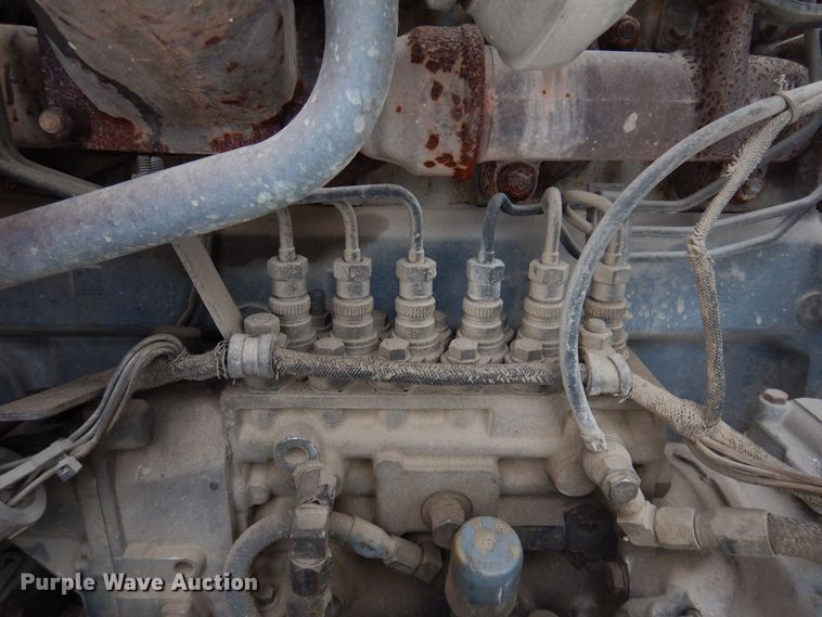 image for item IO9362 1995 Mack RD688S  pothole patcher truck