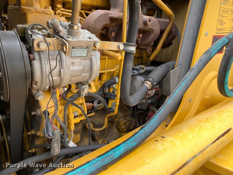 image for item KW9010 2012 John Deere 310SJ  backhoe