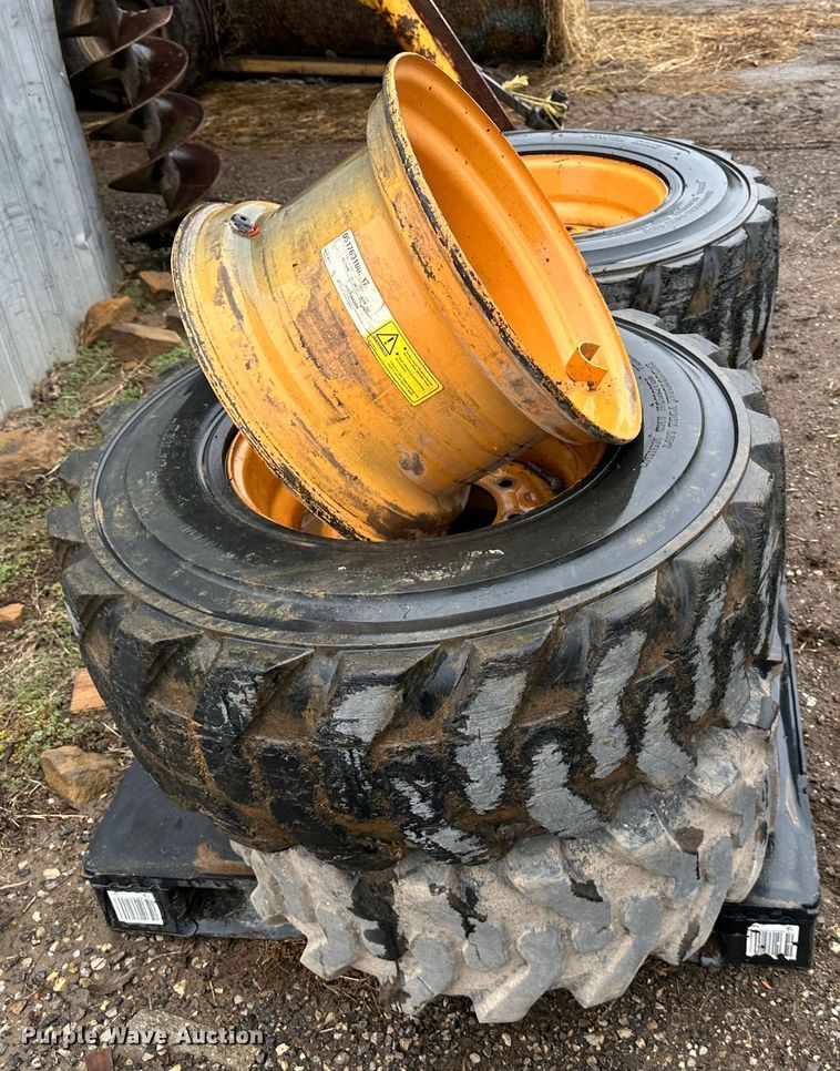 image for item LN9108 (4) Case 12-16.5 skid steer tires and wheels