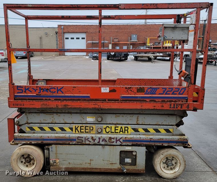 image for item LV9326 1999 Sky Jack SJIII 3220  scissor lift