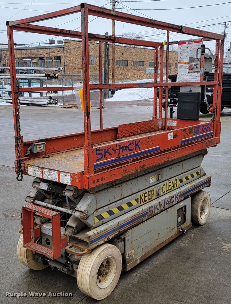 image for item LV9326 1999 Sky Jack SJIII 3220  scissor lift