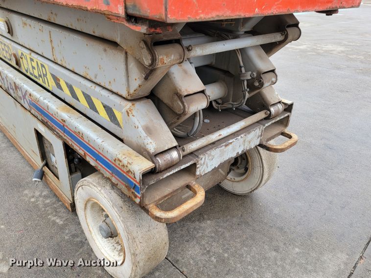 image for item LV9326 1999 Sky Jack SJIII 3220  scissor lift