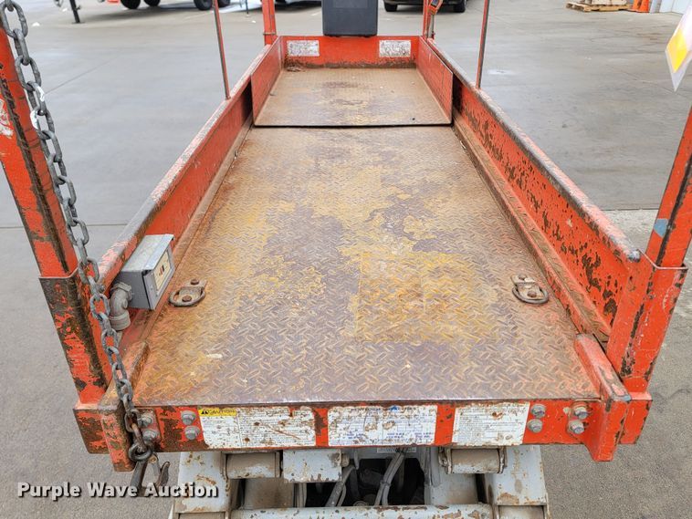 image for item LV9326 1999 Sky Jack SJIII 3220  scissor lift