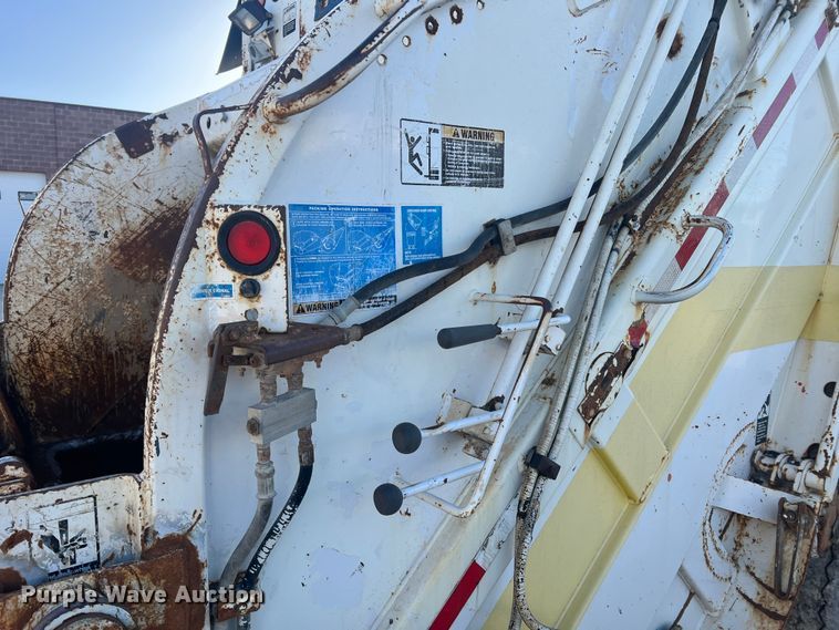 image for item MM9150 2002 Crane Carrier Low Entry  refuse truck