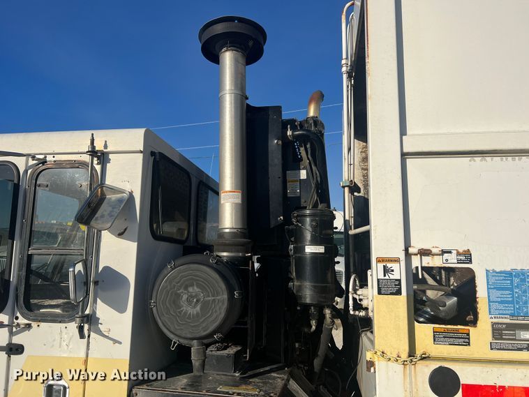 image for item MM9150 2002 Crane Carrier Low Entry  refuse truck