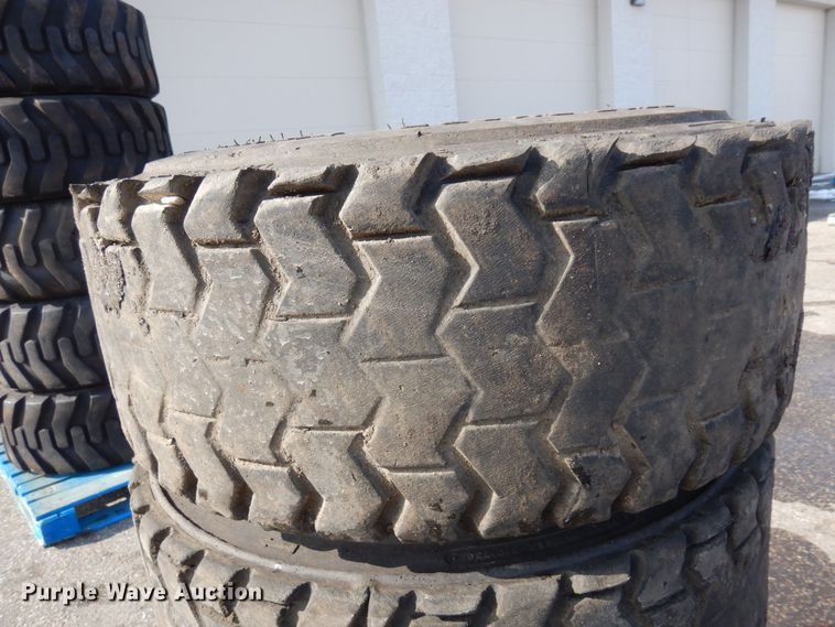 image for item DQ7297 (4) 12-16.5NHS skid steer tires and wheels
