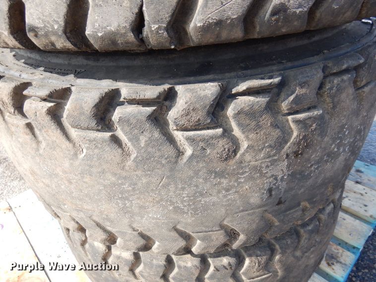 image for item DQ7297 (4) 12-16.5NHS skid steer tires and wheels