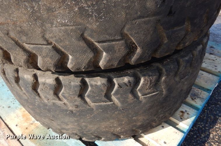 image for item DQ7297 (4) 12-16.5NHS skid steer tires and wheels