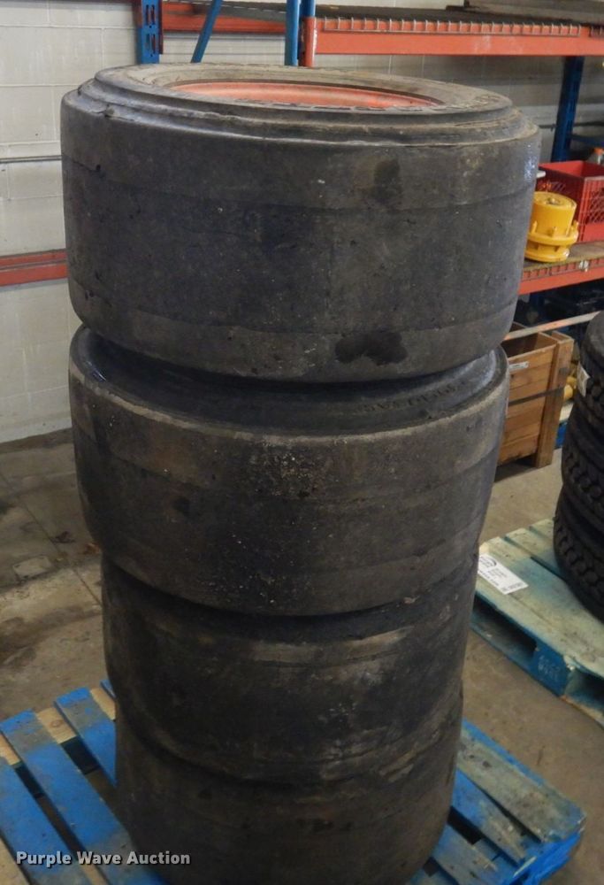 image for item KU9850 (4) 12-16.5 skid steer tires and wheels