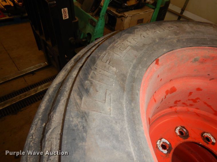 image for item KU9850 (4) 12-16.5 skid steer tires and wheels