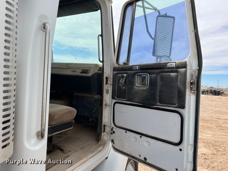 1993 White GMC winch truck in Pecos, TX Item DP0016 sold Purple Wave