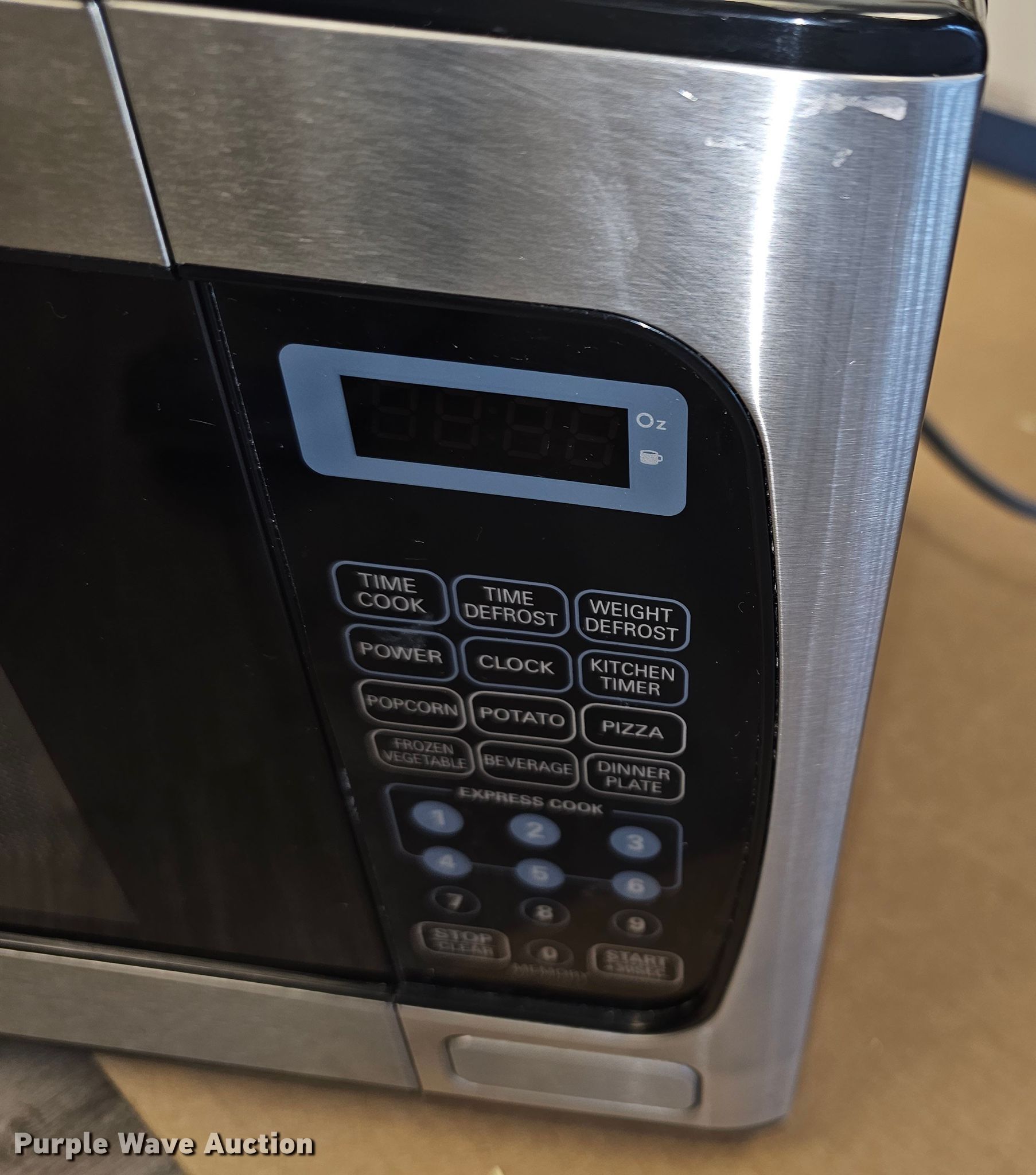 Emerson microwave in Paola, KS Item KS9450 sold Purple Wave