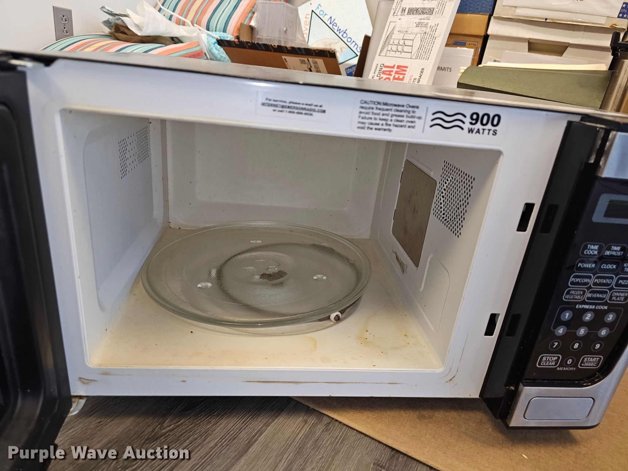 Emerson microwave in Paola, KS Item KS9450 sold Purple Wave