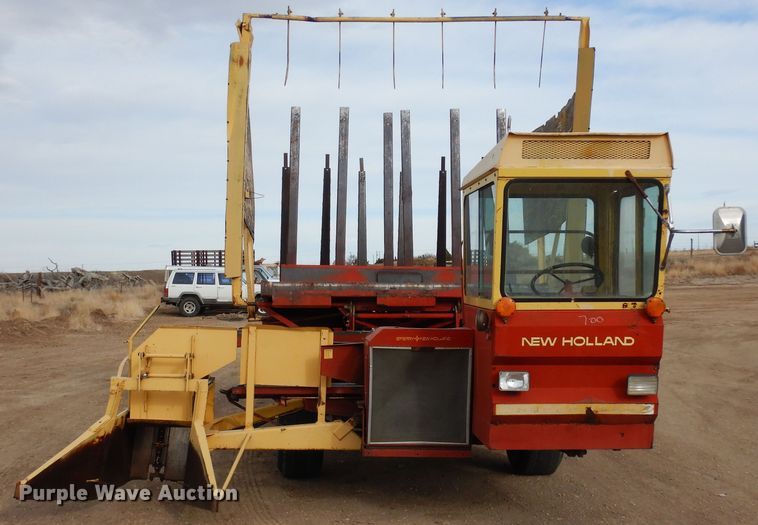 image for item DN6320 New Holland 1049  bale stacker