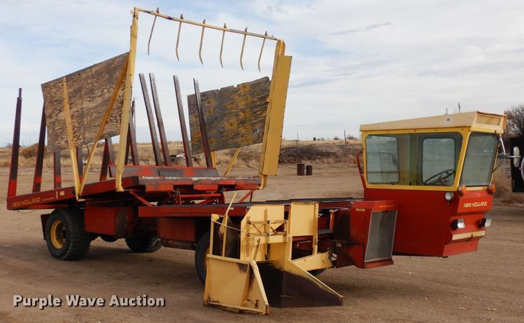 image for item DN6320 New Holland 1049  bale stacker