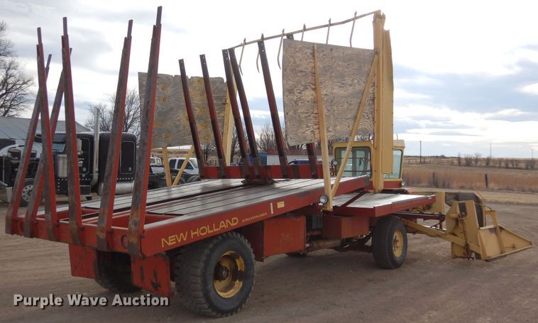 image for item DN6320 New Holland 1049  bale stacker