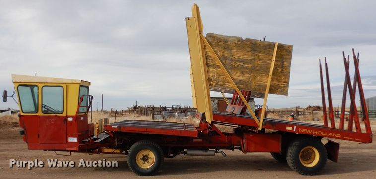 image for item DN6320 New Holland 1049  bale stacker