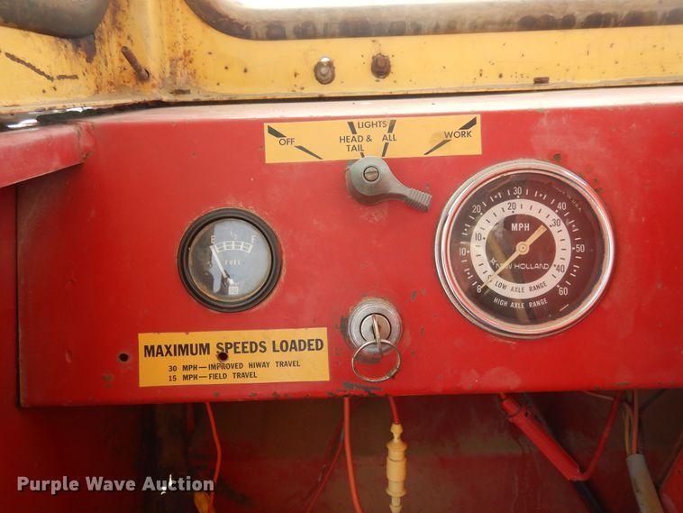 image for item DN6320 New Holland 1049  bale stacker