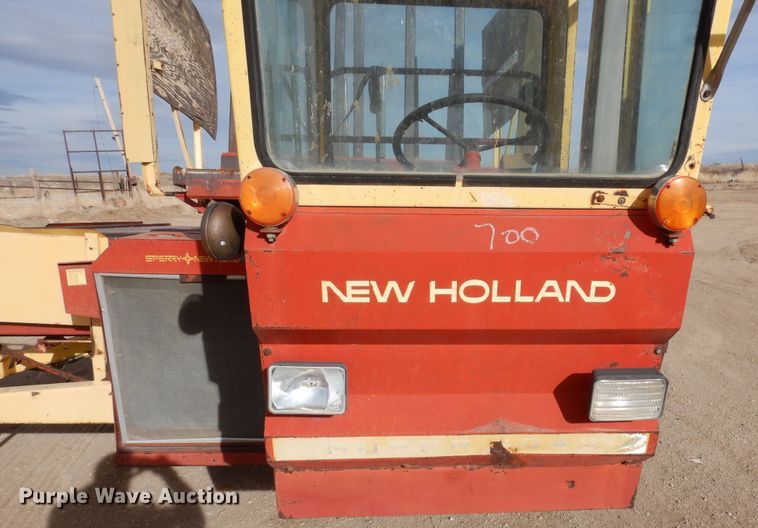 image for item DN6320 New Holland 1049  bale stacker