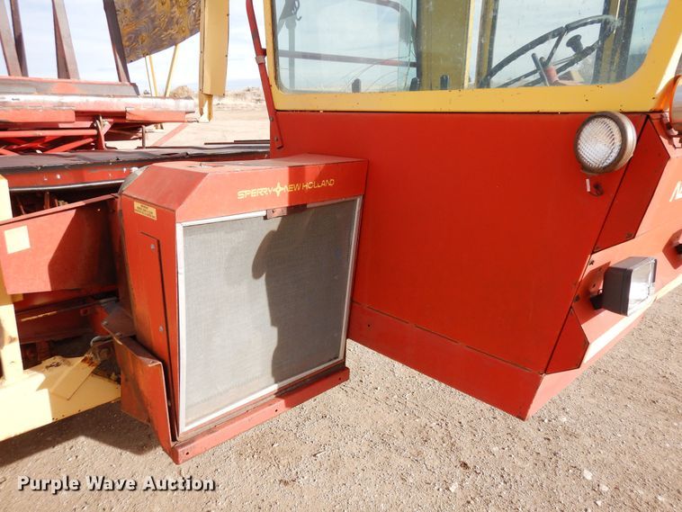 image for item DN6320 New Holland 1049  bale stacker