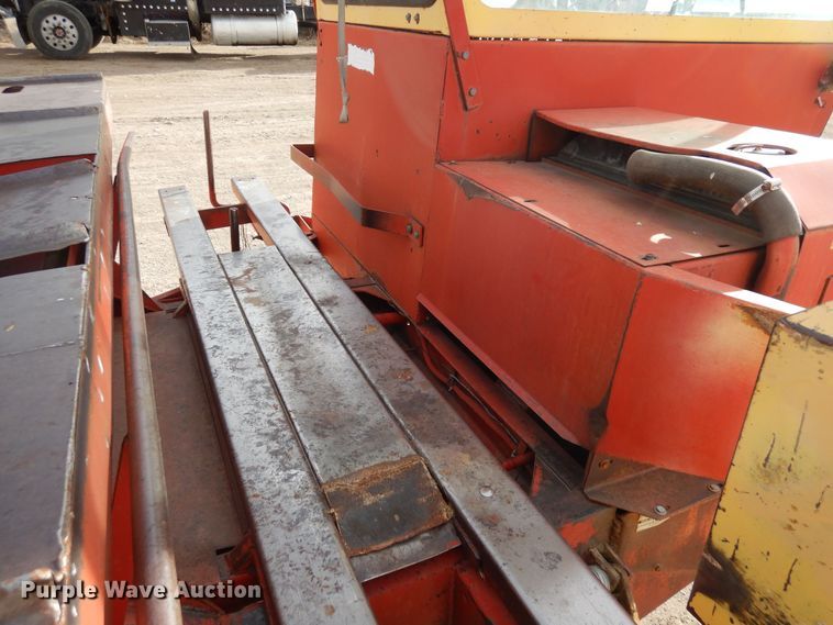 image for item DN6320 New Holland 1049  bale stacker